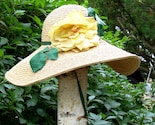 STRAW SUN HAT WITH YELLOW ROSE AND CARVED JADE NECK PULL BEAD