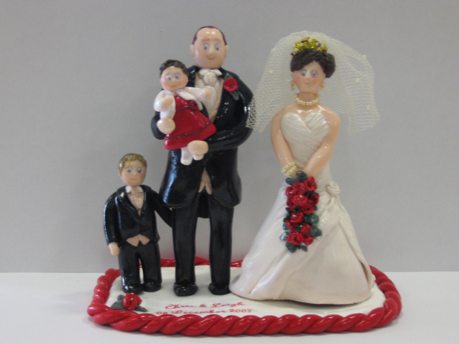 Tags: family wedding cake topper fimo bride groom personalised clay figurine