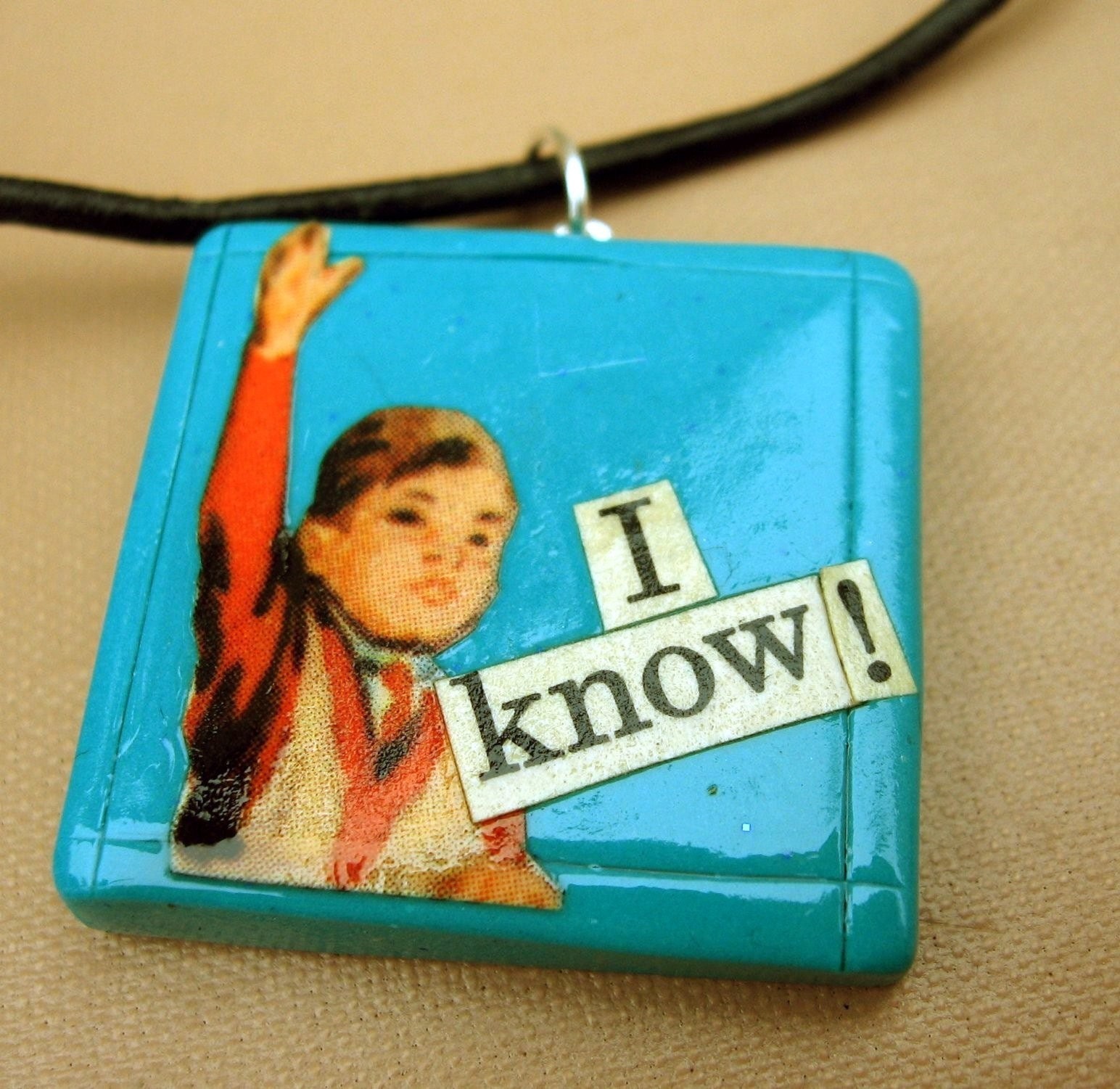 I Know pendant (on leather cord)