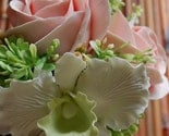 White Cattleya Orchid, Peach Roses and Green Cluster Flowers