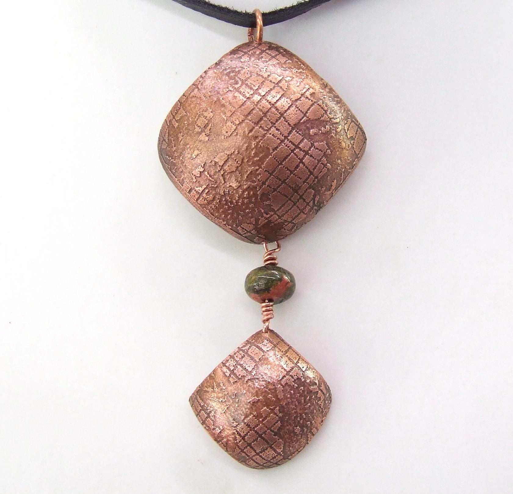 etched copper pendant